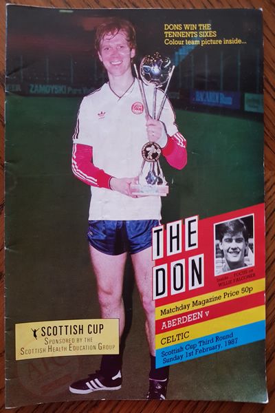 Alex McLeish holding the Tennents Sixes 1987 Cup on the front cover.